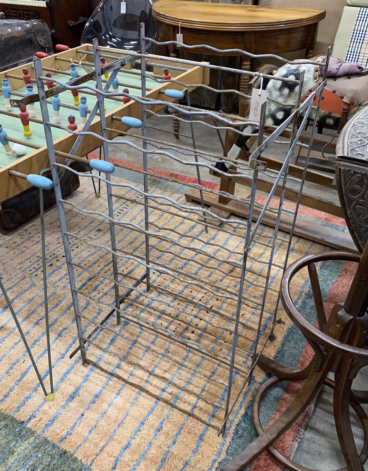 A French wrought iron wine cage, width 55cm, depth 44cm, height 102cm